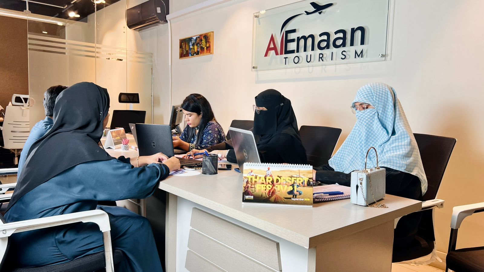 Al Emaan Tourism office team